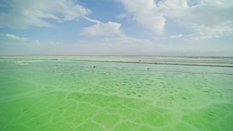 High-Angle Wide-Angle Aerial View of Mangya Emerald Lake and Kunlun Mountains 動画素材 343799028