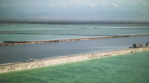 High-Angle Wide-Angle Aerial View of Mangya Emerald Lake and Kunlun Mountains Stock Footage 343799270