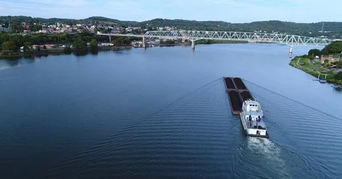High Angle Wide Establishing Shot of Coal Barge on Ohio River  	 Stock Footage 80271961