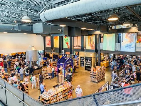High-angle wide shot of a bustling visitor center Tillamook Creamery and re.. Photos