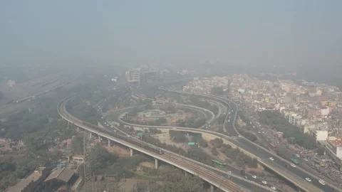 High-angle wide shot of a busy urban highway interchange in India. Stock-Footage 330154286