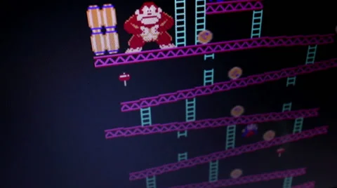 HIgh angle wide shot 'Donkey Kong' retro arcade vintage videogame during game Stock Footage 55455154
