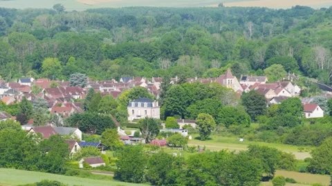 A high-angle, wide shot of the picturesque village of Accolay Deux Rivieres in Stock Footage 346674542
