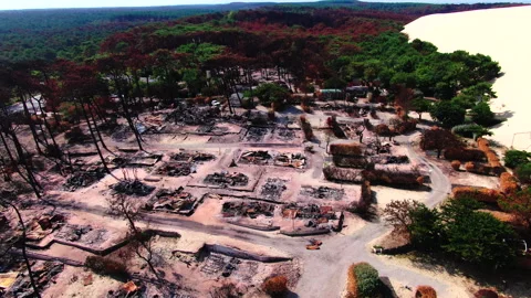 High angle wide shot then drone moving away from burned area, Gironde Stock Footage 332065845