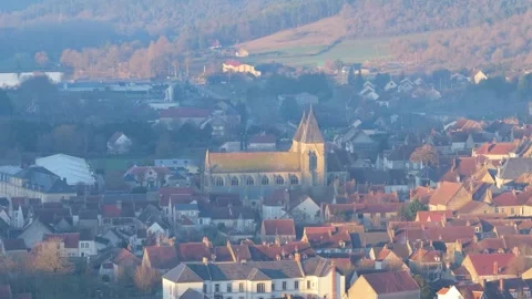 A high-angle, wide shot of Varzy, a picturesque village in France, featuring a Stock Footage 346721916