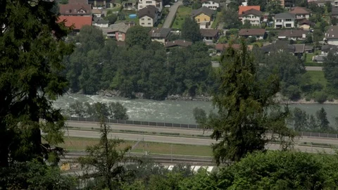 High angle WS of river and highway in the shadow of the Val Parghera landslide Stock Footage 86757343