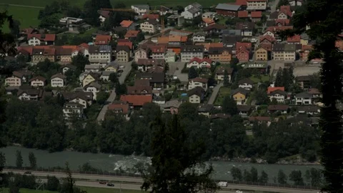 High angle WS of village in the shadow of the Val Parghera landslide Stock Footage 86757267