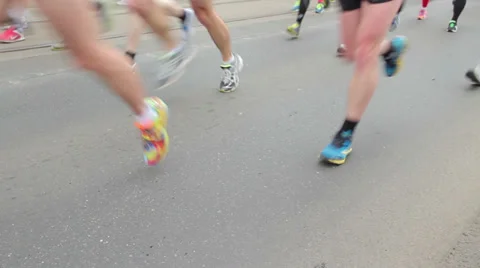 High angled detailed shot of runners legs, people running at half Marathon event Stock Footage 36989926