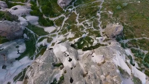 High angled, tracking shot of tall, pointed rocks Video stock 100887786