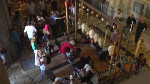 High angles shot of people praying in the Church of the Holy Sepulchre Stock Footage 145390596