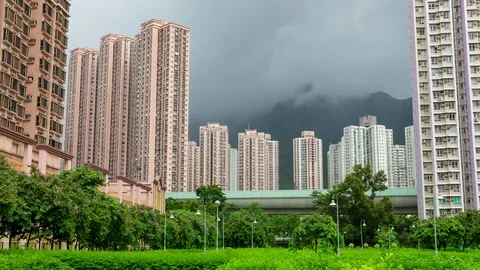 High apartment with moving clouds in a rain day Stock Footage 93734543