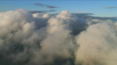 High approaching Aerial Clouds midday Stock Footage 34513006