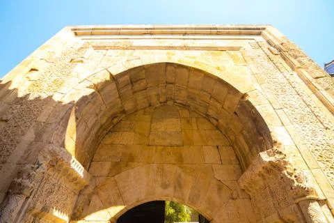 The high arch is built of stone blocks Stock-Fotos