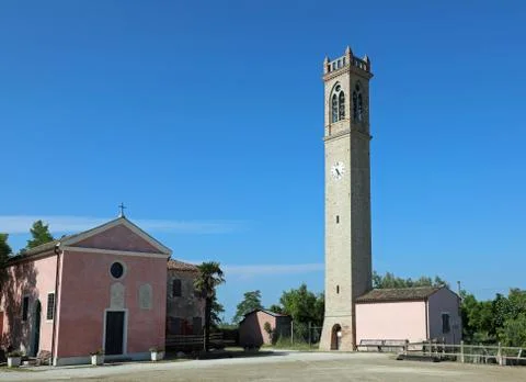 High bell tower on the square of Lio Piccolo Town a small Village near Venice Fotos de archivo