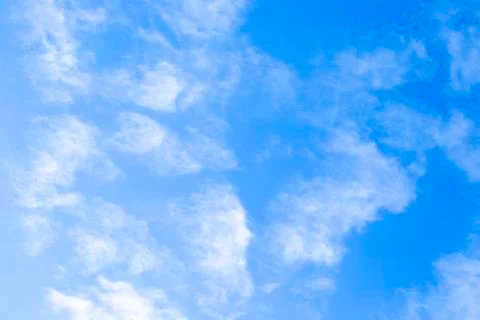 High blue sky with white clouds Stock Photos