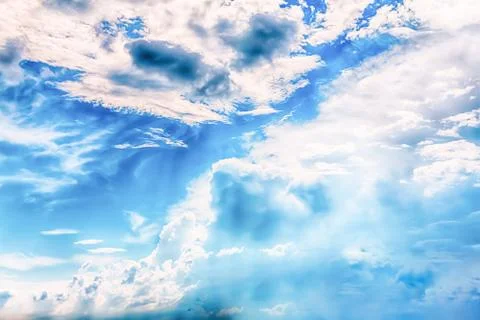 High blue sky with white clouds illuminated by sunlight background air base Stock Photos