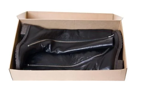 High boots in a box Stock Photos