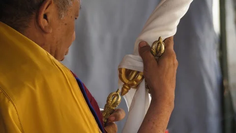 High buddhist lama with ritual objects inaugurating Chhempal Thang Stupa. Stock-Footage 127935827