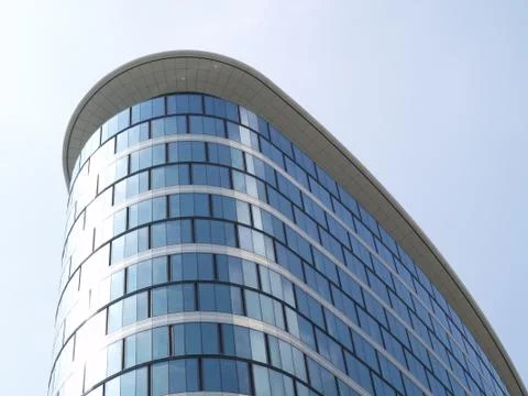 High building with reflecting windows. Photos