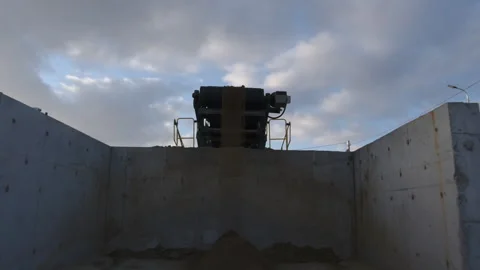 High capacity dispenser machine stands behind concrete block Stock Footage 258896856