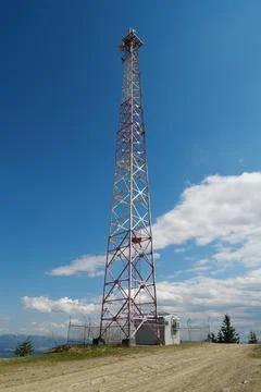 High cell tower in the mountains Stock Photos