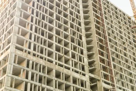 High cement foundation of a multi-storey building on the background Stock Photos