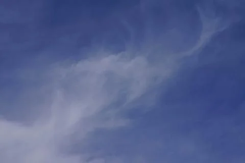 High cirrus clouds, blue sky Stock Photos