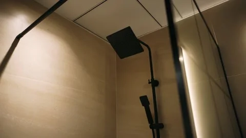 High-class shower cabin in a marble bathroom	 Stock Footage 259892160