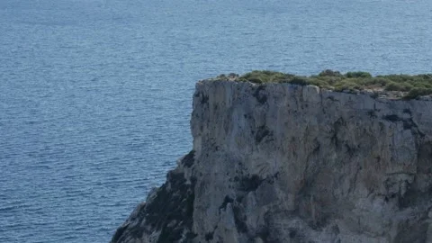 High cliff overlooking the Mediterranean Sea Stock Footage 163603949