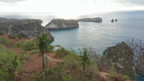 High Cliff with a View of the Blue Ocean Waters in Nusa Penida, Indonesia Stock Footage 133823703