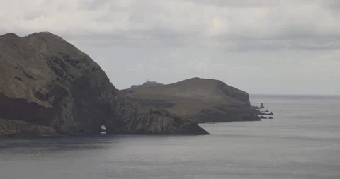 High cliffs on coast of Madeira island at Ponta De Sao Stock Footage 246328868
