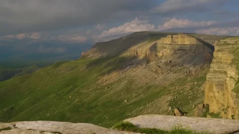 High cliffs of the Kanjol plateau in summer, Kabardino-Balkaria Republic, Russia Stock Footage 325812370