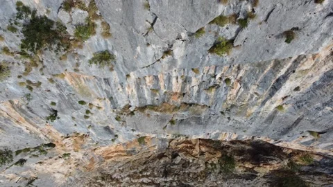 High cliffs on the mountain, aerial drone view. Rocks in nature. Stock Footage 247313224