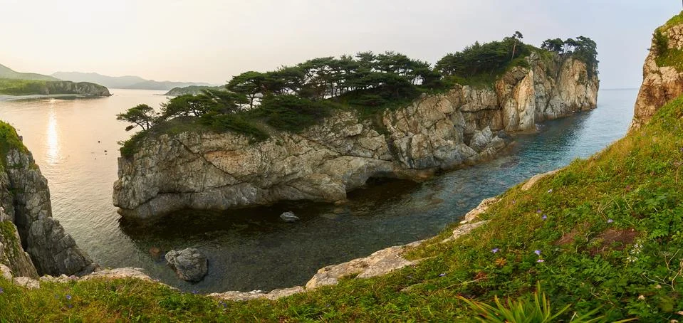 High cliffs in the ocean. Stock Photos