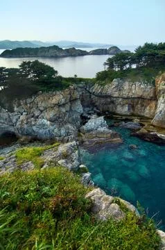 High cliffs in the ocean. Фото