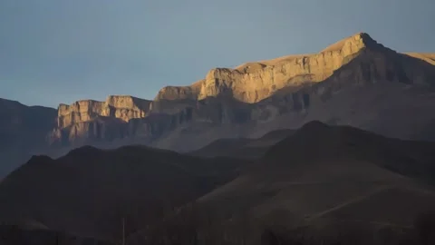 High cliffs in sunlight at sunset Stock Footage 149379508