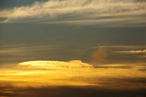 High clouds over Ambleside at sunset. Stock Photos