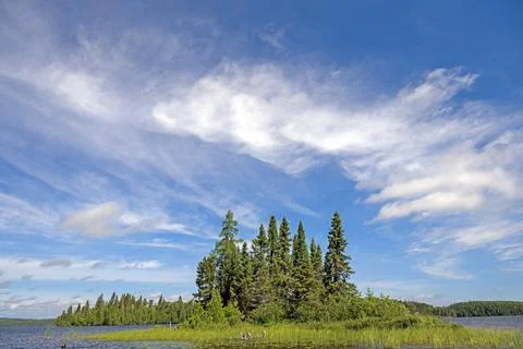 High Clouds Over a Remote Island on a Sunny Day Fotos Stock