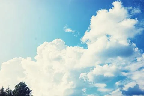 High clouds in the summer sky. Sky background. Meteorological observations .. Stock Photos
