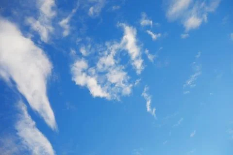 High clouds in the summer sky. Sky background. Meteorological observations .. Stock Photos