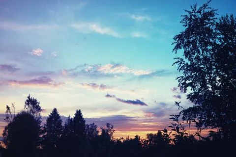 High clouds in the summer sky. Sky background. Meteorological observations .. Stock Photos