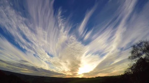High Clouds at Sun set in a blue sky Autumn Stock Footage 82798564