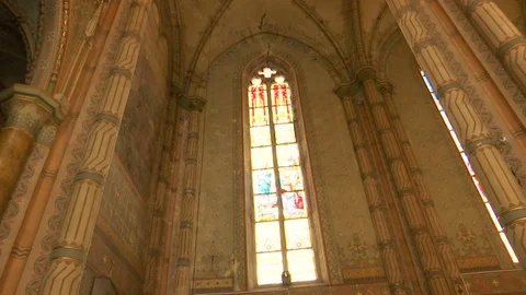 High columns and windows in catholic cathedral Stock Footage 108434812