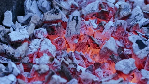 High combustion temperature of charcoal. Red-hot charcoal gives off intense heat Vídeos de archivo 146538439