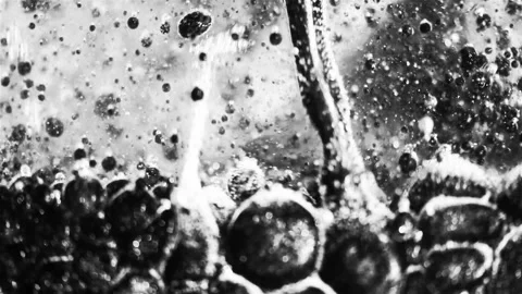 High contrast black and white oil and water Stock Footage 144910140
