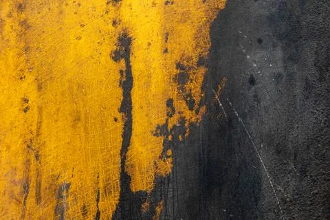 High-Contrast Metal Rust Texture: Abstract Yellow &amp; Black Pattern Stock Photos