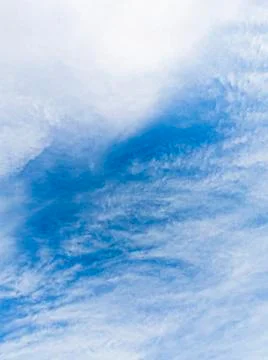 High contrast sky texture background with light clouds for compositions Stock Photos