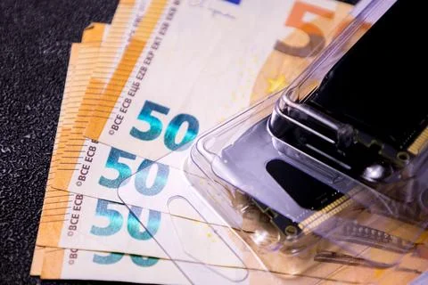 High-cost computer memory concept with euro banknotes Stock Photos
