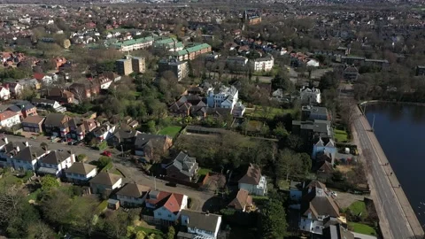 HIGH CRANE DOWN TOWNSCAPE REVEAL ARIAL Stock-Footage 150152924