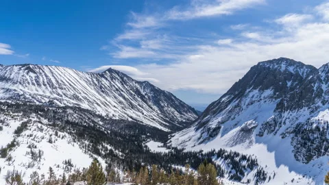 High up in Crazy Mountains wind and clouds Video stock 167054162
